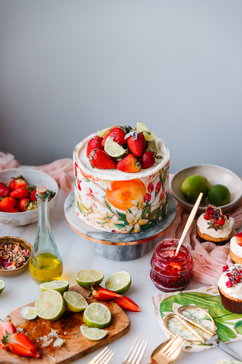 Olive Oil Cake with lime frosting berries jam and sugar sheet