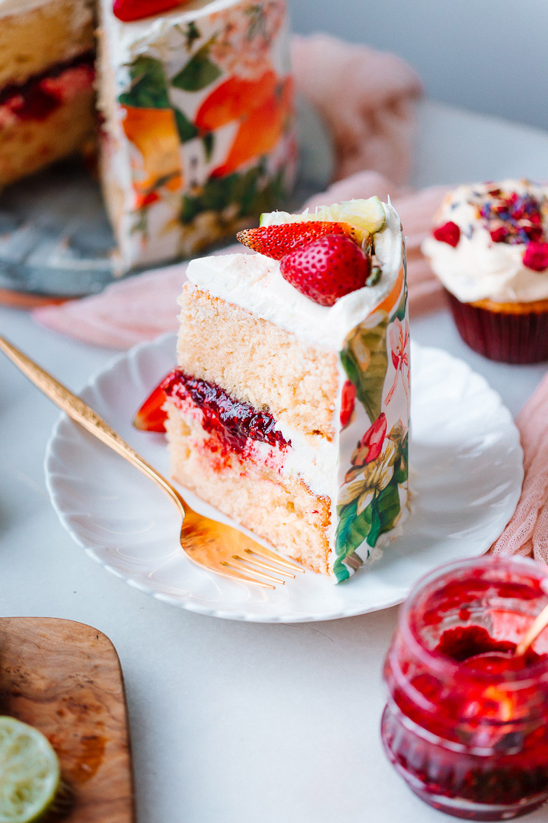 Olive Oil Cake with lime frosting berries jam and sugar sheet