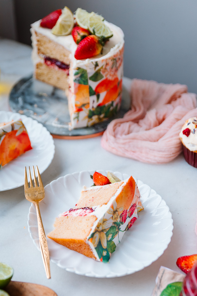 Olive Oil Cake with lime frosting berries jam and sugar sheet